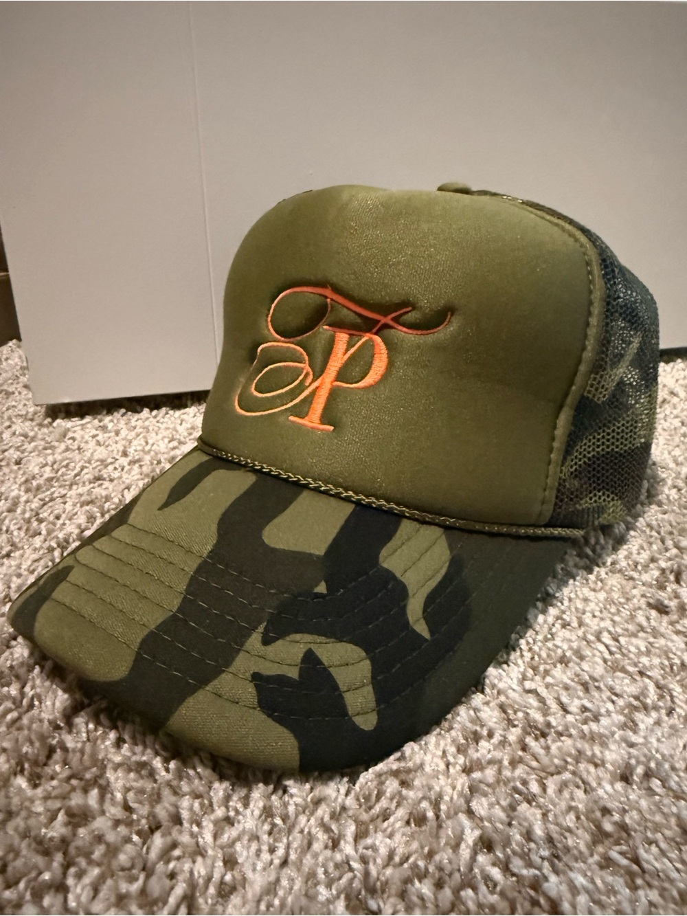 Green Camo Trucker Hat with Orange 'TP' Embroidery